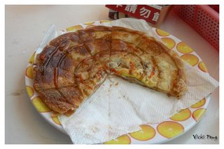 吃一半的蔥油餅加蛋